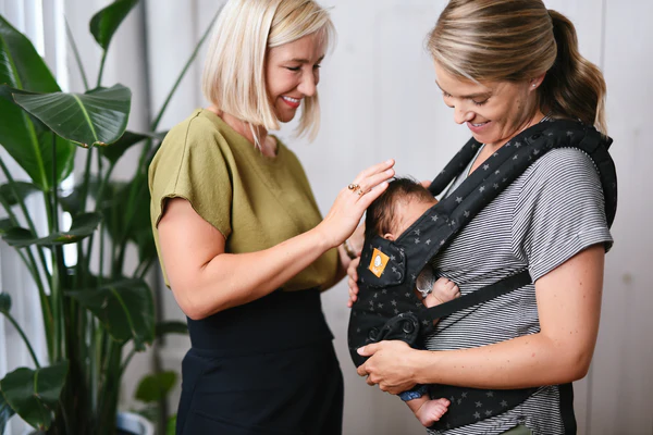 A Guide To Nursing While Babywearing